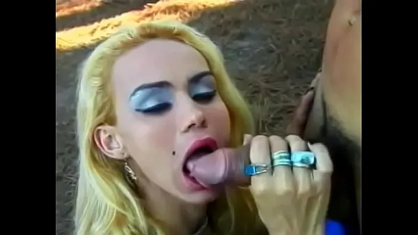 HD Young blonde transvestite is fucked in the ass under a tree topp videoer