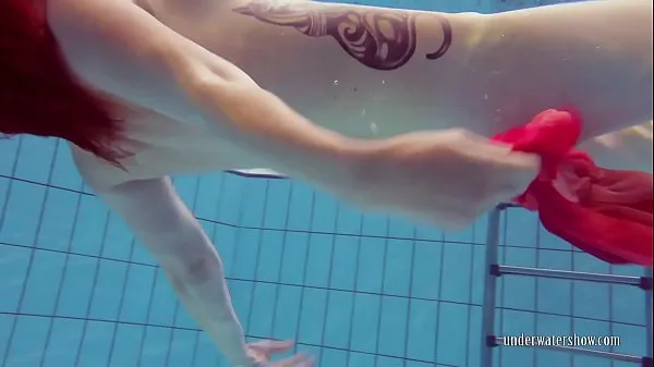 HD Petite teen Katrin swims naked in the pool top videoer