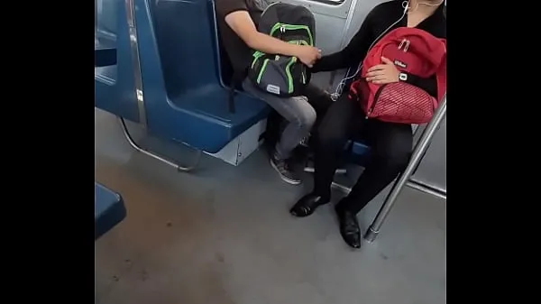 HD Grabbing his cock in the subway najboljši videoposnetki