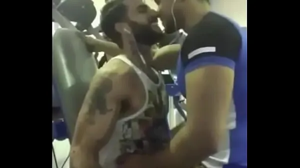 HD A couple of hot guys from India kissing each other passionately inside a gym top videoer