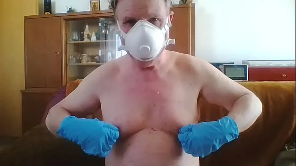 HD Andreas with a dust mask and gloves picks one off najboljši videoposnetki