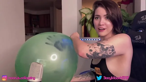HD Inflating a big green baloon top Videos
